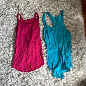 Blue and pink lululemon tank tops